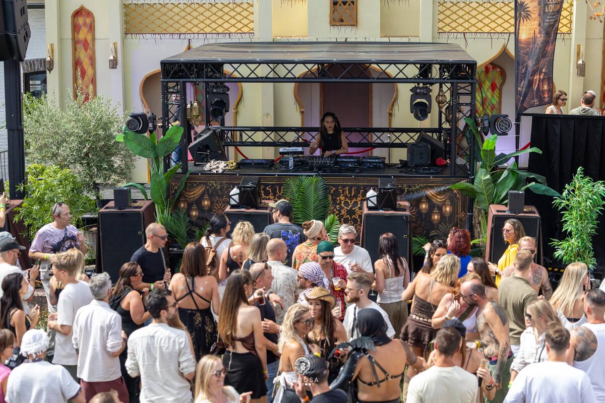Crowd dancing in front of the Nomad Camp stage at Medusa Outdoor